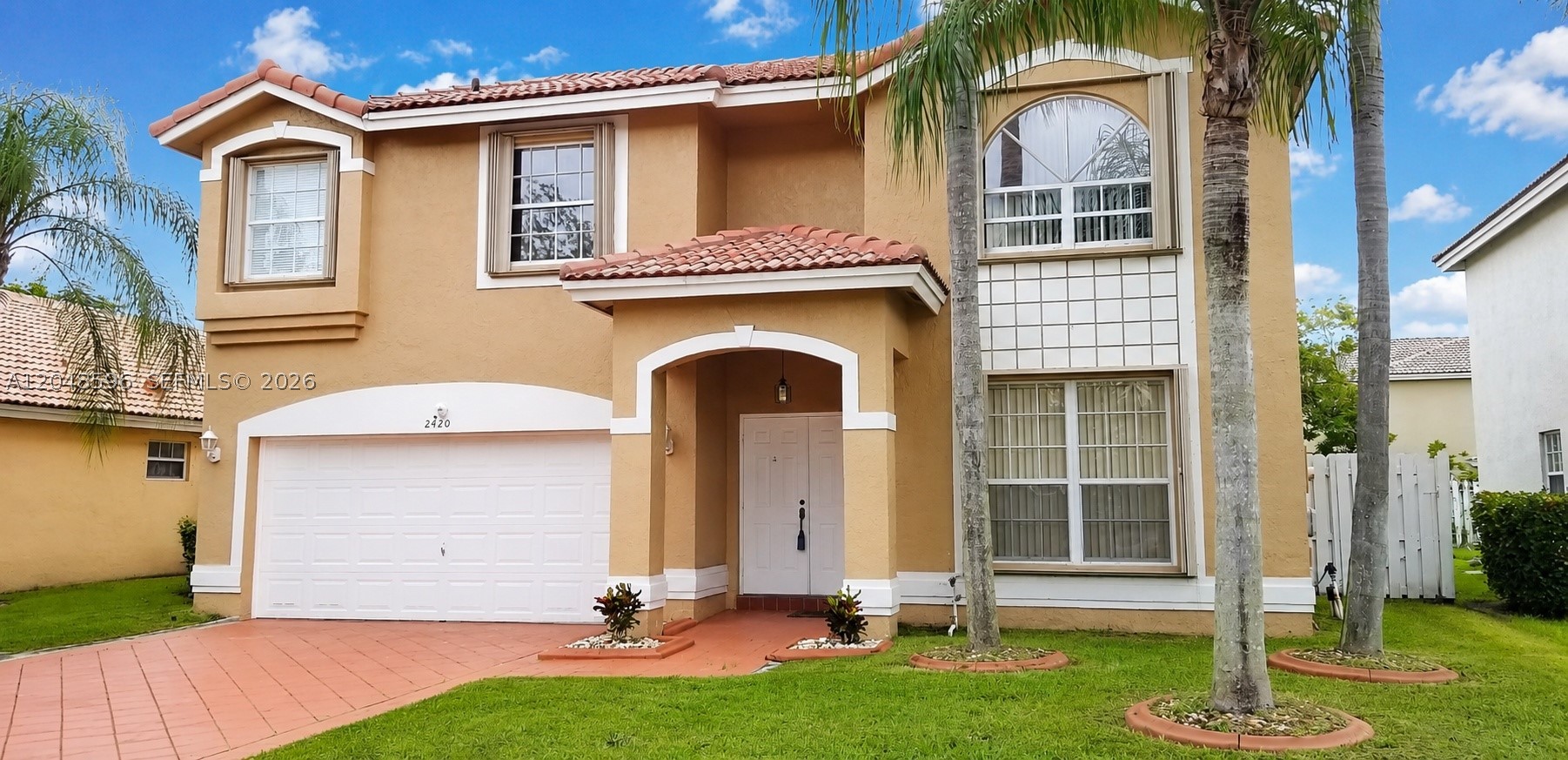 Welcome to this beautiful two-story home located in a secure, gated community directly across from Sawgrass Mills Mall. Designed for comfort and convenience, this spacious residence features tile flooring on the first floor, laminate upstairs, and a beautifully renovated kitchen with a gas stove, dishwasher, microwave, and full-size washer and dryer. Enjoy the privacy of a large fenced backyard, perfect for relaxing, entertaining, or spending quality time with family and friends. Ideally located just 2 minutes from the Sawgrass Expressway, this home offers easy access to shopping, dining, entertainment, parks, and major highways. Combining security, modern updates, generous living space, and an unbeatable location, this is the perfect place to call home for those seeking both comfort and an exceptional South Florida lifestyle.