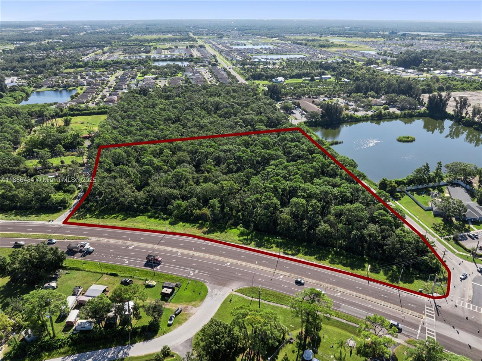 Prime 6.07-acre commercial land in Ruskin, FL! Located at US Hwy 41 & 14th Ave SE, this 264,637 SF parcel offers 714’ of highway frontage in a booming growth corridor just south of College Ave W/SR 674 and minutes from Tampa. Rarely do large tracts with this much frontage on US Hwy 41 become available, making it ideal for retail, mixed-use, medical, office, or service development. With high visibility, strong traffic counts, and flexible potential, this is a premier opportunity for investors and developers to secure a prime site in one of Hillsborough County’s fastest-growing communities.