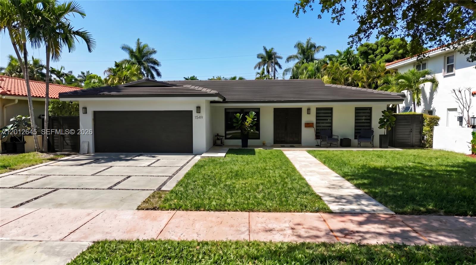 An exceptional opportunity in the heart of Coral Gables. This fully renovated, turnkey 4-bedroom, 2-bathroom residence has been meticulously upgraded with a new roof, new AC, and premium finishes throughout. Designed for effortless living and entertaining, the home boasts a generous lawn and a private patio — your own outdoor retreat in the South Florida sunshine. Nestled on a quiet, closed street offering rare privacy, yet moments away from the University of Miami, world-class dining, boutique shopping, grocery stores, and vibrant entertainment. A true move-in ready gem in one of Miami's most coveted zip codes.