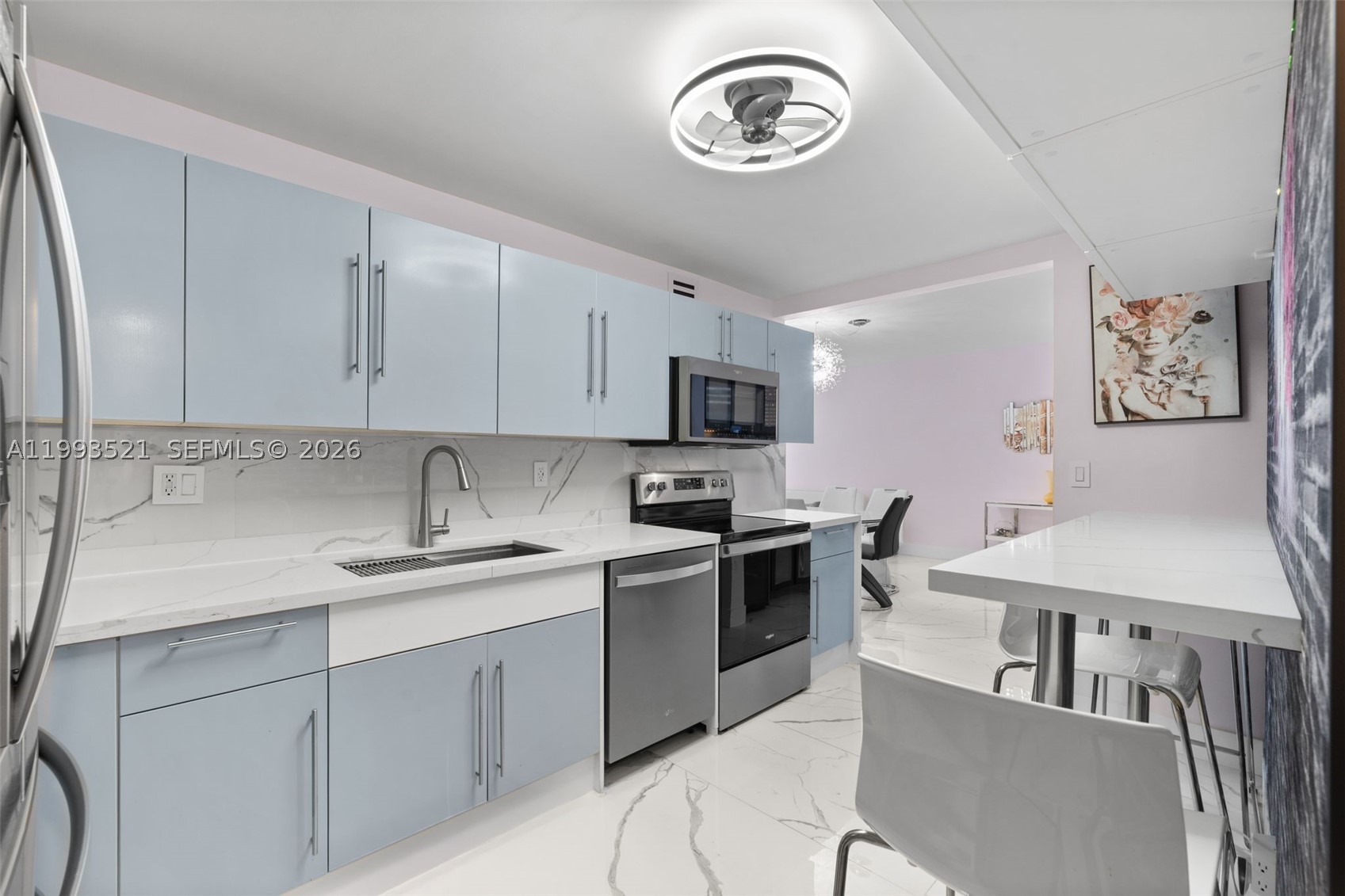 LIVE ACROOS THE BEACH! UNIQUE, HIGH-END, GORGEOUS DESIGN- TRULY ONE KIND*COMPLETELY RENOVATED 1 BED/1,5 BATH SPACIOUS 1,021 SQFT — THE MOST BEAUTIFUL UNIT IN THE BLDG***FULLY REMODELED WITH PERMITS & EXEPTIONAL TASTE* EVERYTHING IS BRAND NEW (2023): NEW A/C, NEW ELECTRICAL PANEL, NEW APPLIANCES, MODERN OPEN KITCHEN WITH SLEEK CABINETS* COFFEE MACHINE & WINE COOLER* FEATURES INCLUDE CUSTOM HIGH BAR TABLE WITH 3 BAR STOOLS, HUTCH WITH LIGHTING, DISPLAY CABINETS & EXTRA WALK-IN PANTRIES***NEW TILE FLOORING THROUGHOUT* BEAUTIFUL BALCONY WITH UPGRADED FLOORING AND FURNITURE* SPA-STYLE BATHROOM WITH SMART TOILETS AND LIGHTED MIRRORS.* INCLUDES "TRIDDAER AIR" PURIFICATION SYSTEM (2023, $1,500)* HIGH-QUALITY MODERN FURNITURE IS NEGOTIABLE, INCLUDING SONY 85” TV IN LIVING ROOM & SONY 65” TV IN BEDROOM* "ECOVACS ROBOTIC VACUUM & MAP"INCLUDED* HOA INCLUDES: WATER,CABLE TV, INTERNET,2-PARKING SPACES* CAN BE RENTED IMMEDIATELY — PERFECT FOR INVESTORS* ENJOY ACCESS TO SISTER BUILDING ON THE OCEAN SIDE WITH FULL RESORT-STYLE AMENITIES: 2 FITNESS CENTERS, 2 HEATED POOLS, MASSAGE ROOMS, STEAM ROOM, SPA, POOL-SIDE CABANAS, TIKI BAR, 24-HOUR SECURITY, CONCIERGE, VALET, CONVENIENCE STORE, BUSINESS CENTER AND MORE*WALK TO THE HOLLYWOOD BROADWALK, RESTAURANTS, AND SHOPS* PET FRIENDLY***NEXT TO BRAND NEW PUBLIX*RENOVATED BUILDING RESIDENCE ON HOLLYWOOD WITH PRIVATE BEACH ACCESS! SHORT DRIVE TO FORT LAUDERDALE AIRPORT*  DON'T MISS OUT!!!