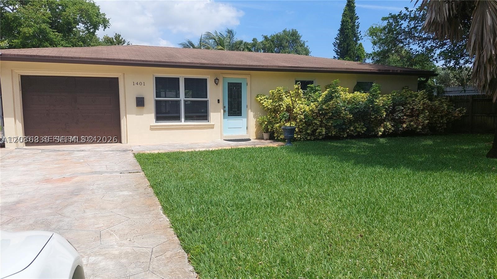 Nicely updated 2 bedroom 2 bath.  Open kitchen, tile floors and each bedroom is ensuite. I car garage and additional parking.  Extra large fenced backyard and plenty of room for a pool.  Edgewood neighborhood just south of St Rd 84 and east of I95.