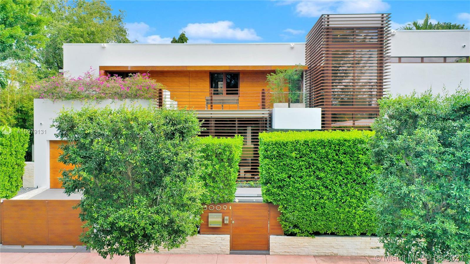 First time on the market. Located on prestigious Pine Tree Drive, this modern home offers 5,119SF, 5 beds & 5.5 baths, maid quarters & guest home. Open spaces feature large rooms including office & separate den. Architectural details abound from beautiful ceilings, elegant delta lighting, marble & quartz flooring on the first floor & oak flooring on the second. The Snaidero kitchen features Miele appliances, double ovens, beautiful cabinetry & chic details. Bathrooms call to mind world-renowned spas while bedrooms feature huge closets. Walls of windows blend inside and outside bringing in the beautiful landscaping by Lewis Aquui. The house is equipped with a generator. The exterior of the house beautifully finished with Prodema. Outdoor spaces include a pool summer kitchen, outdoor dining.