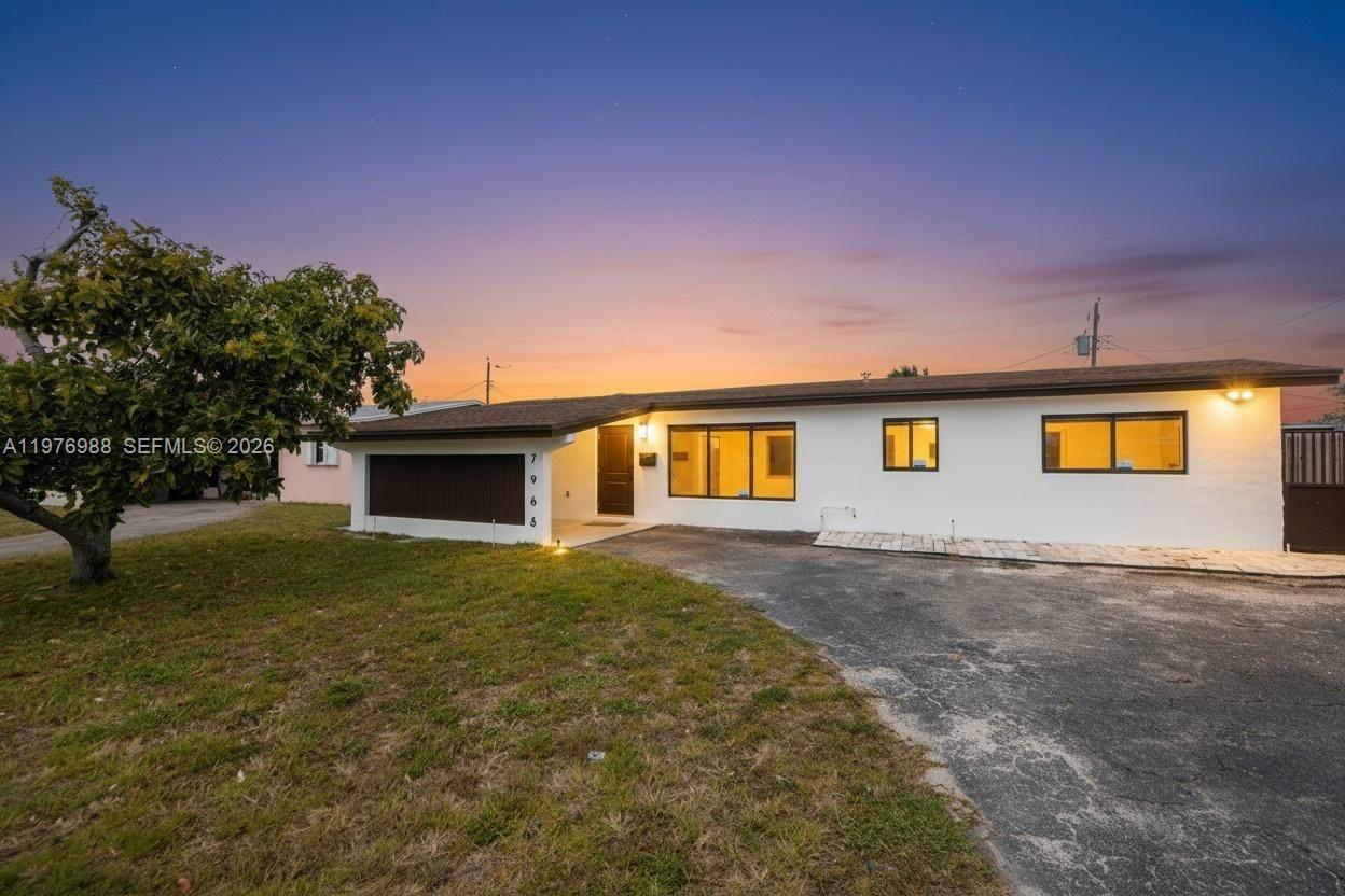 Seller offering $5,000 toward buyer’s closing costs! Move-in ready and completely updated 3-bedroom, 2-bath pool home featuring impact windows and doors and a newer roof for peace of mind and insurance savings. The home offers a bright, modern layout with a beautifully renovated kitchen, sleek countertops, stainless steel appliances, and updated bathrooms. Enjoy great curb appeal with a circular driveway providing plenty of parking. The spacious backyard features a private pool and patio area—perfect for entertaining and enjoying South Florida living year-round. Conveniently located near major highways, shopping, dining, and schools.