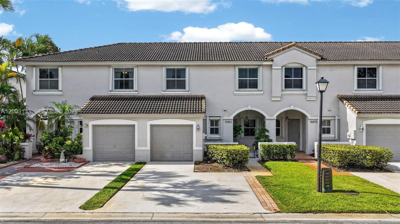 Welcome to this beautifully renovated 3-bedroom, 2.5-bath townhouse in the highly desirable, guard-gated community of Sterling Place in Pembroke Shores. Thoughtfully updated throughout, this two-story home features a modern kitchen with updated appliances, stylish finishes, and move-in ready condition that truly stands out. The open layout flows seamlessly between living and dining areas, leading to a large backyard — perfect for entertaining, outdoor dining, or simply enjoying your private outdoor space. Upstairs you'll find three spacious bedrooms, including a generous primary suite. Additional highlights include a 1-car garage plus 2 additional driveway spaces and ample guest parking nearby. Residents enjoy a community pool, lush landscaping, and 24-hour guarded security. Conveniently located minutes from I-75, top-rated schools, major shopping, dining, and entertainment. Rarely available. This one is a must-see!