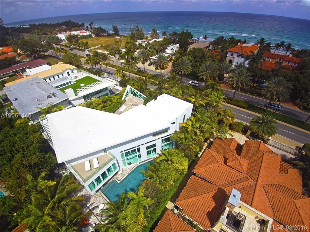 Introducing ‘The Ark’. Unparalleled residence in the exclusive neighborhood of Golden Beach.  This architectural showpiece features 6 bedrooms, 8 baths, and a spacious 8,350 sq. ft. open floor plan. A 20 ft. stunning  glass atrium makes this home truly one-of-a-kind.  Property boasts the finest finishes - imported marble flooring, custom Italian kitchen, high ceilings, home theater, salt water pool and “smart home” technology. Enjoy ocean views and lush landscaping from sprawling rooftop deck.