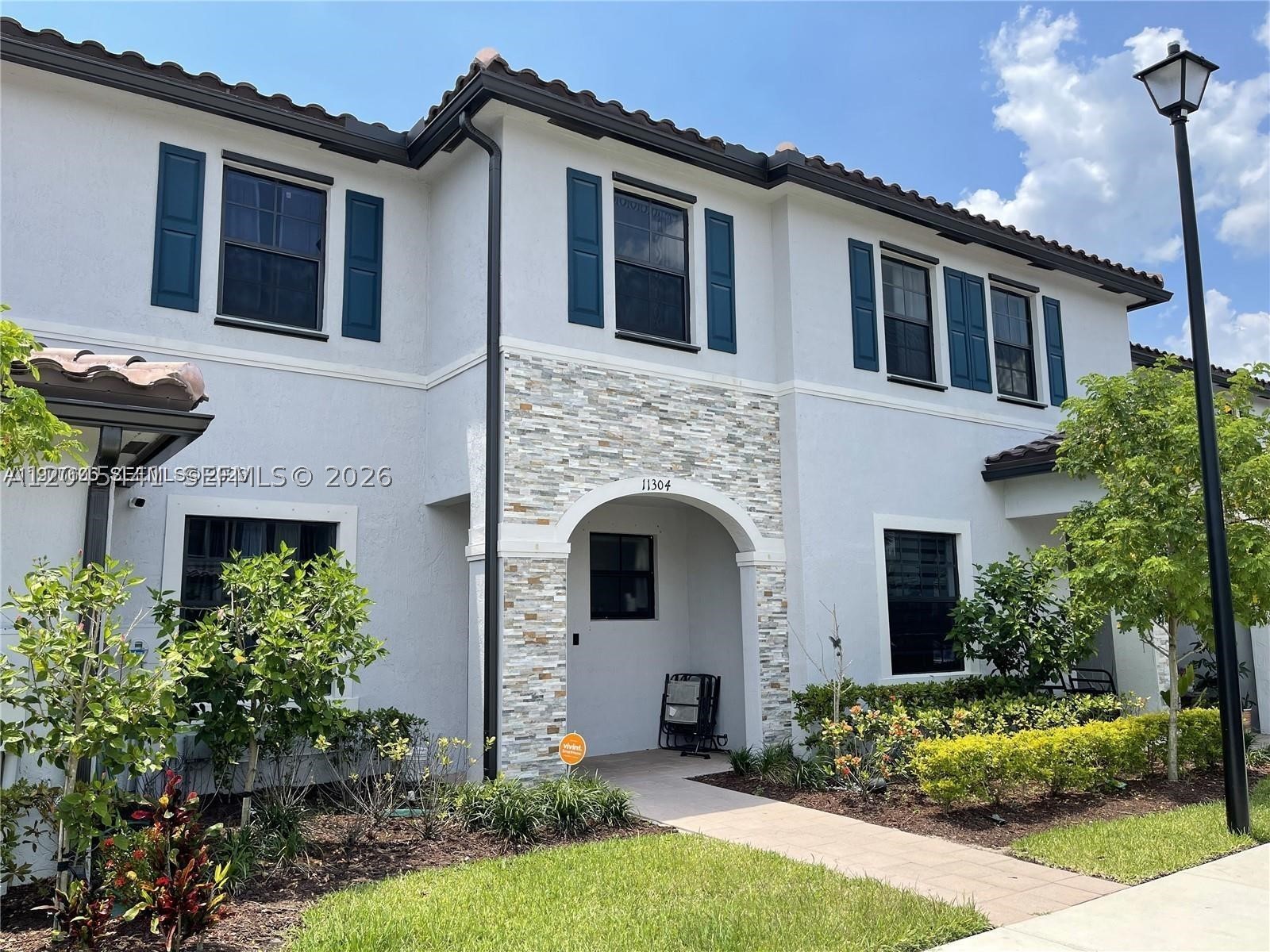 Beautifully updated 3BR/2.5BA townhouse in the sought-after Coco Palm Villas community in Homestead. Built in 2019, this 1,488 SF two-story home offers an open-concept layout ideal for everyday living and entertaining. Bright living/dining area flows into a modern kitchen with stainless steel appliances and abundant cabinet storage. Private fenced patio perfect for outdoor gatherings. Upstairs: spacious primary suite with walk-in closet and en-suite bath, plus two additional bedrooms and a full bath. Convenient half bath on the main level. Community amenities include pool, clubhouse, and playground. Minutes to the Florida Turnpike, shopping, dining, and schools. Move-in ready, great for homeowners or investors. Easy to show.