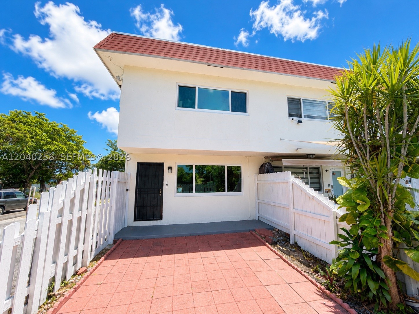 Beautiful 2-story townhouse for sale at 1450 NE 151st St #101, Miami, FL. This move-in ready home features 2 spacious bedrooms and 1 full bathroom upstairs, plus a convenient half bathroom on the first floor. Enjoy a bright and functional layout with plenty of natural light, impact windows throughout, and a private front patio along with a fenced backyard—perfect for relaxing, entertaining, or creating your own outdoor retreat.

Additional features include washer and dryer hookups, 1 assigned parking space, and a desirable location close to shopping, dining, schools, and major highways. Whether you're a first-time homebuyer, investor, or looking to downsize, this charming townhouse offers comfort, convenience, and great value.

Don't miss this opportunity to make this beautiful property your new home!