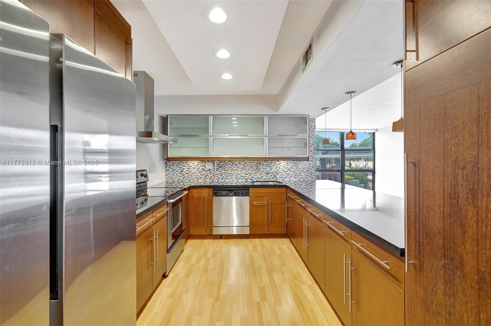 Price reduced! Motivated owner—must rent immediately. This is your chance to secure the best-valued renovated apartment in the highly desirable Oceanview Complex, located in the exclusive Three Islands gated community. The unit features an open-concept kitchen, an enclosed den perfect for a home office or guest space, warm wood floors, a newer A/C system, and generous closet space. The building offers full-service, resort-style amenities including 24/7 security, a modern fitness center, tennis courts, and a heated waterfront pool with stunning Intracoastal views. High-speed internet is included in the rent. Ideally located just minutes from the beach, fine dining, beautiful parks, airports, and world-class shopping. Available for immediate occupancy—act fast!