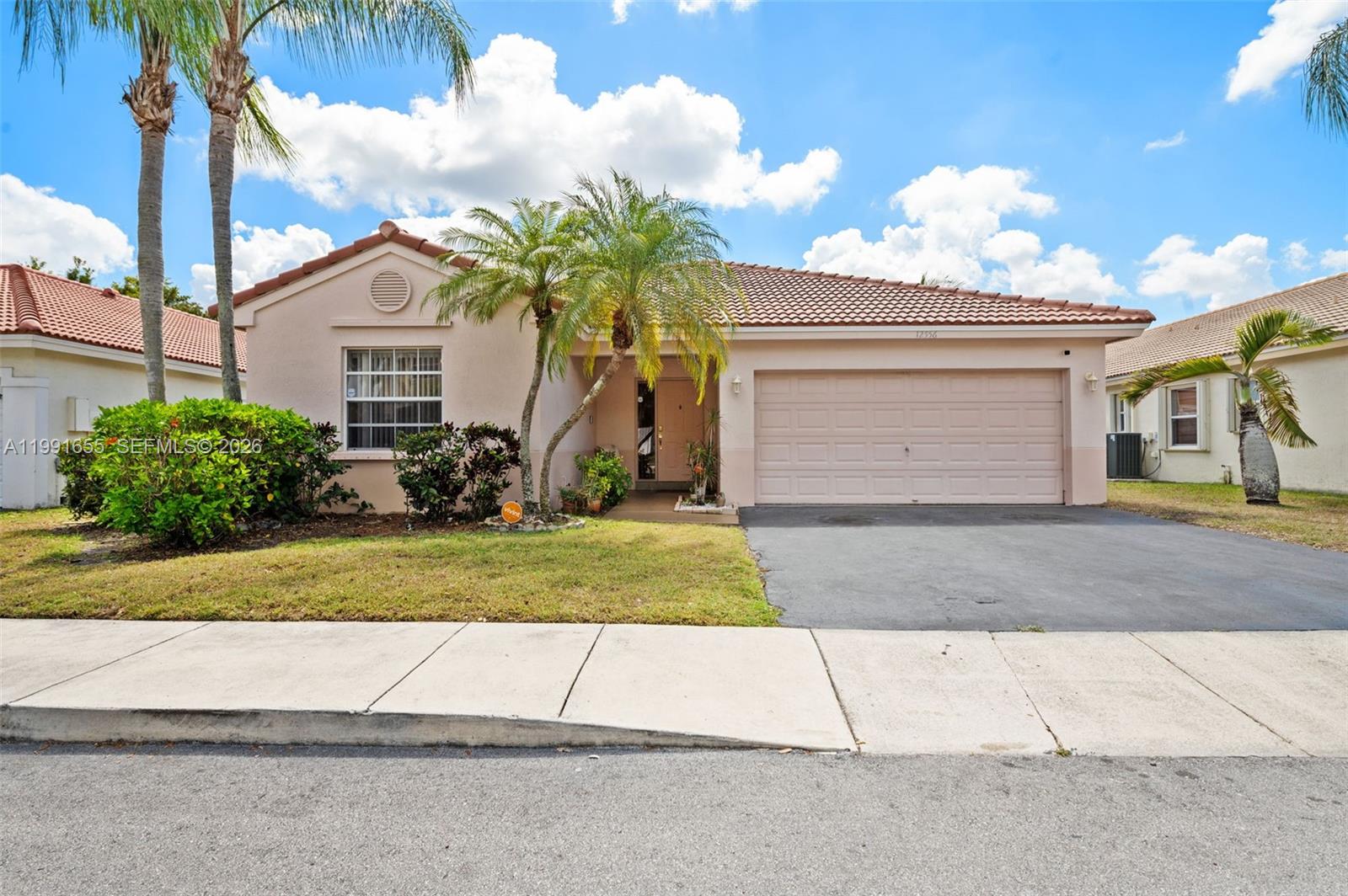 **First Buyer failed to qualify back on market** We are so CONFIDENT with our list price that seller will offer $10,000 towards closing costs with full price offer!  Beautifully updated 3-bedroom*, 2-bath home featuring vaulted ceilings and abundant natural light throughout. *3rd bedroom is currently a den but can be converted back. The open living spaces showcase stylish wood-look tile flooring and flow seamlessly into an upgraded kitchen, along with renovated primary and guest baths.
Enjoy true Florida living with a screened, covered patio overlooking a fully fenced yard—perfect for relaxing or entertaining outdoors. Mango tree!  Ideally located just 5 minutes from Sawgrass Mills Mall, offering world-class shopping, dining, and entertainment, as well as the Panther Arena and easy access to 595 for convenient commuting. Walking distance to a top-rated elementary school and nearby park. Additional highlights include a 3-year-old roof and hurricane shutters for added peace of mind.