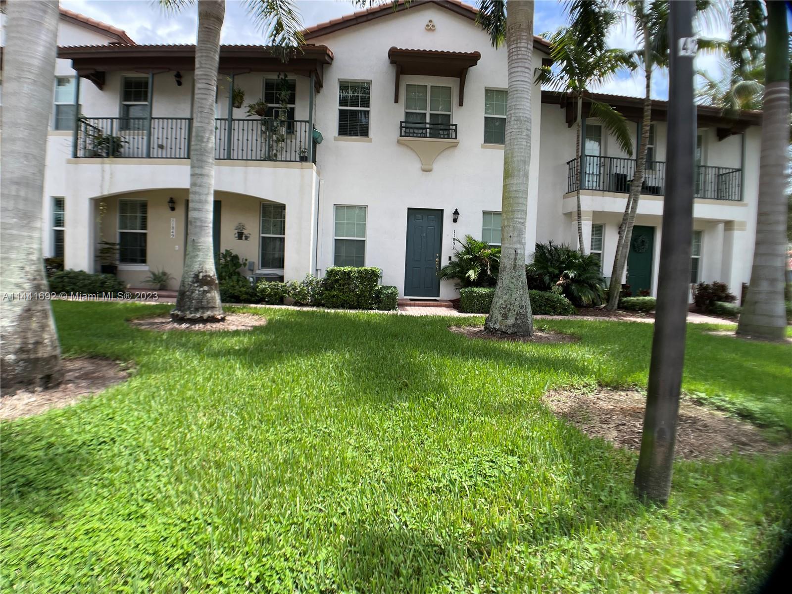 A gorgeous and well-kept two-story townhome in the desirable gated community of Montclair. This townhome comes with laminate wood flooring throughout and tile flooring in bathrooms and kitchen. Granite countertops, stainless steel appliances. The laundry room conveniently located on the second floor with NEW washer & dryer included. Hurricane impact windows and doors and 2 car Garage. Association includes exterior maintenance, cable, internet & alarm service. Enjoy the amenities of Community Pool, Clubhouse, Gym and a Jogging/biking trail along the lake. All offers must be summited  with a DU & emailed to Listing agent directly.