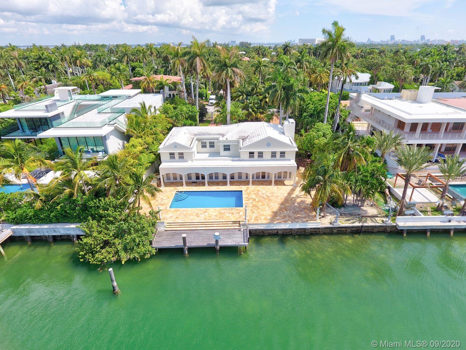 Pristine Sunset Island II is one of the most coveted locations on Miami Beach. Enjoy 120 feet of waterfront and an oversized lot. This estate is in need of major renovation. You can also tear it down and make room for new construction. Great opportunity to create your island idyll in between two $20 million plus new constructions.