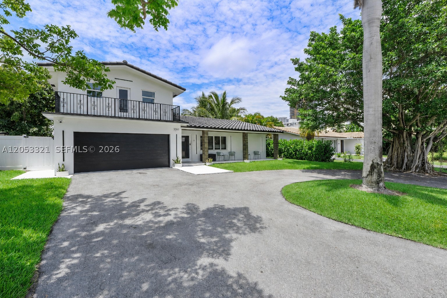 Experience the best of South Florida living in this beautifully renovated two-story home, ideally located in a quiet, gated community just minutes from the beach. This spacious residence offers 5 bedrooms, 5 full baths, and 1 half bath, providing plenty of room to spread out and entertain. The open-concept floor plan features a gourmet kitchen with a large center island, wine cooler, coffee station, premium stainless steel appliances, and abundant custom cabinetry, flowing seamlessly into the main living and dining areas — perfect for hosting family and friends.
Step outside to your own private backyard oasis, complete with a sparkling pool and a covered tiki hut with built-in BBQ area, ideal for relaxing or entertaining year-round. Head up to the rooftop terrace to take in breathtaking evening sunsets around the fire pit or unwind in the outdoor lounge. Additional highlights include a spacious game room with a ping-pong table and large-screen TV, an oversized driveway with ample parking, and designer finishes throughout.
Tucked into a well-established, quiet residential community, this home offers easy access to South Florida's best beaches, dining, shopping, entertainment, golf courses, and major highways. A rare opportunity to enjoy true luxury coastal living. Schedule your private showing today — homes like this don't last long! Available for seasonal rental too.