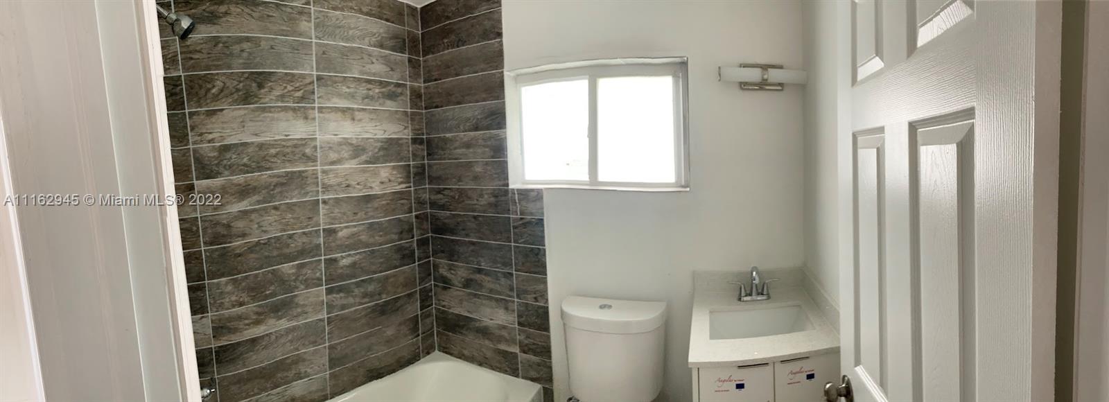 E LIBERTY CITY SEC A - Residential Lease