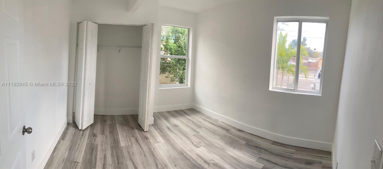E LIBERTY CITY SEC A - Residential Lease