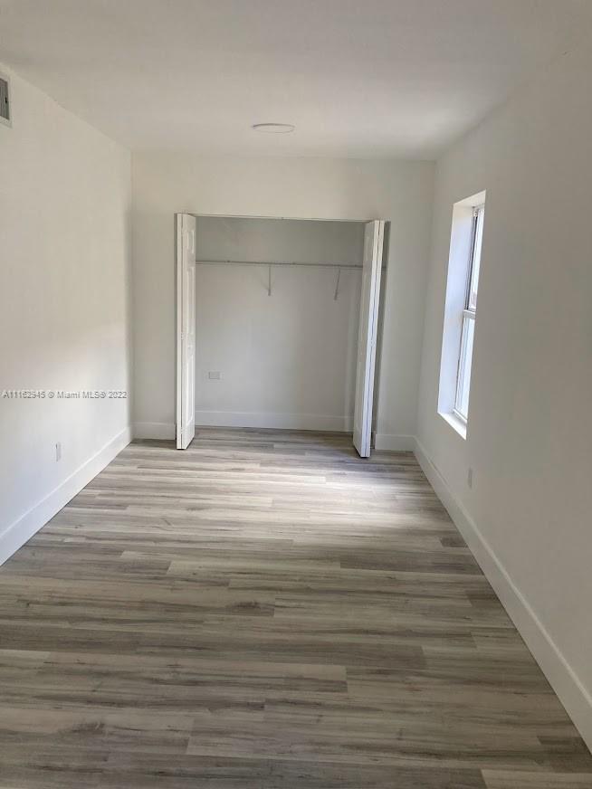 E LIBERTY CITY SEC A - Residential Lease