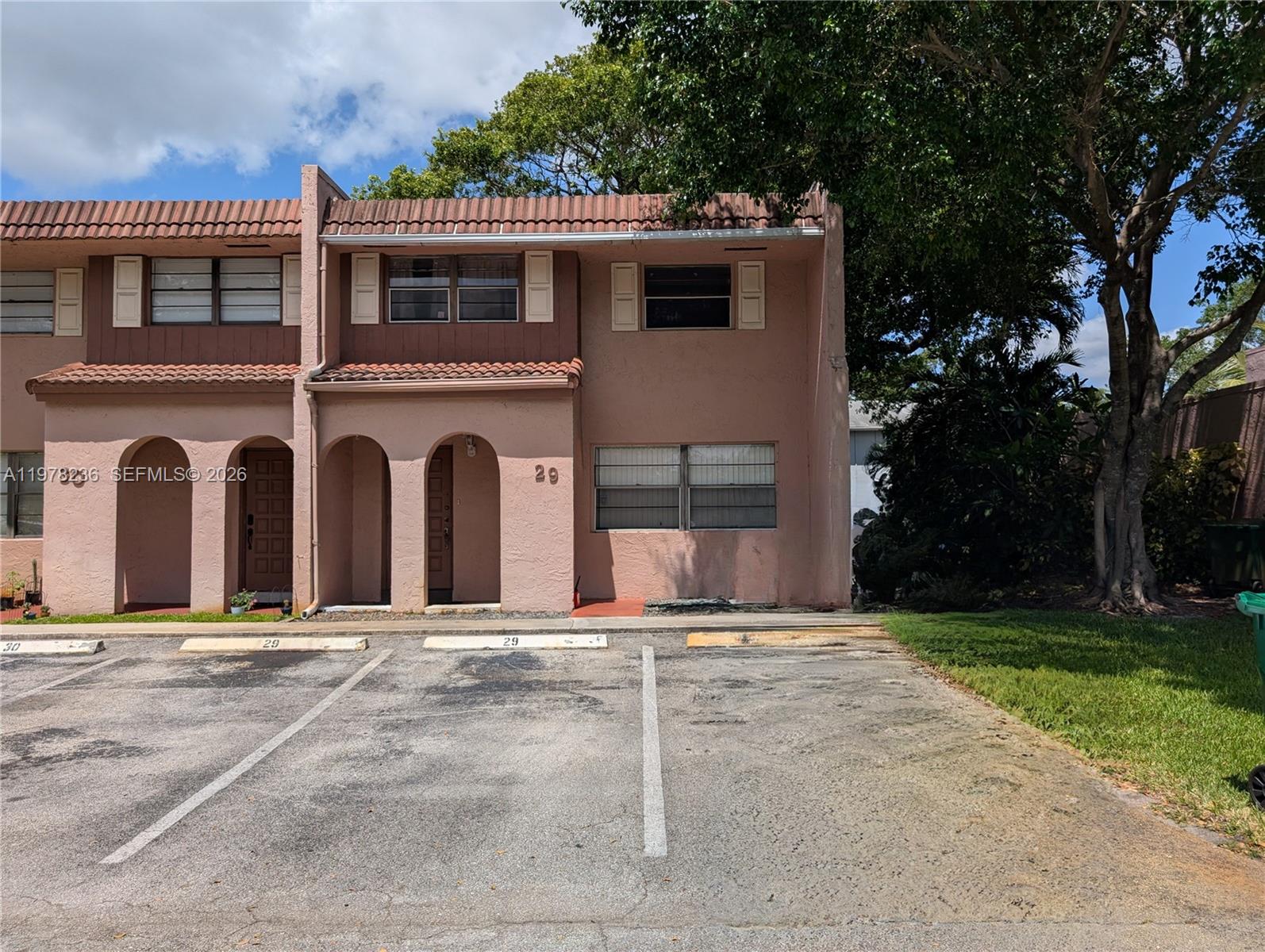 Spacious 3-bedroom, 2-bathroom townhouse located in a welcoming community with access to a pool and kid-friendly playground. Conveniently located just minutes from I-595, with easy access to universities, major retailers, restaurants, and the mall. Photos were taken in 2021 and may not reflect current condition. Tenant-occupied.