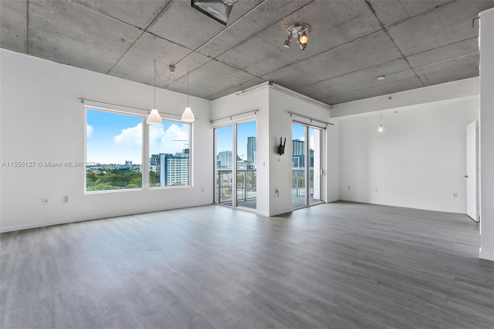 Open loft in Historic Riverside overlooking the Miami River - recently updated with brand new S/S appliances the interior comprises over 700 SF of living space with laminate wood and tile flooring throughout, offering a spacious open kitchen and living area. Includes 1 assigned parking space and additional outdoor storage. Central to Downtown Miami, Little Havana, Coconut Grove, and Brickell City Center with direct access to I-95. Amenities include a gym, infinity-edge lap pool, sauna, tennis court, meditation garden, dog park, clubhouse, business center and gourmet Spanish restaurant Jamon Iberico Pata Negra, 24-hour concierge and valet.