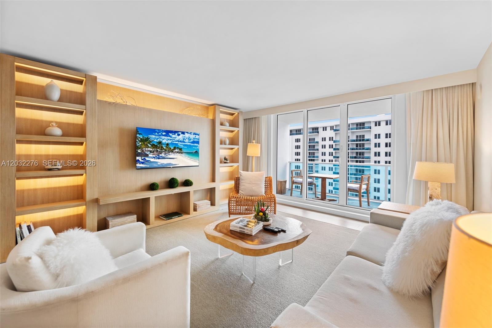 Experience the pinnacle of eco-luxury living in this meticulously designed one-bedroom, one-and-a-half-bath residence at the iconic 1 Hotel & Homes South Beach. Perched on the 14th floor, Unit 1406 offers 893 square feet of sophisticated living space with breathtaking, unobstructed ocean views that capture the essence of coastal living. Interior Finishes features a Gourmet Kitchen custom Italian Italkraft cabinetry, sleek White Quartz countertops, and Yakarta Blanco porcelain backsplash. Fully equipped with premium stainless steel appliances by Sub-Zero and Bosch . Luxurious Bath: Floor-to-ceiling Travertine, dual-lush toilets, and LEED-certified Waterworks fixtures for a spa-like experience. Elegant Touches Brazilian Portobello porcelain flooring flows throughout, complemented by energy-efficient sliding glass doors leading to a private balcony. Convenience: Includes in-unit Bosch washer & dryer and advanced Salto locking system, 5-Star Resort Amenities Private Access: Dedicated residential lobby and entrance staffed by a 1 Hotel concierge, Wellness: State-of-the-art fitness center and full-service Bamford Spa, Aquatic Pleasures: Access to four distinct pools, including a stunning rooftop pool with skyline views . Exclusive Services w Complimentary Tesla house car service, 24/7 room service, and valet parking. A unique Lucrative short-term rental policy allowed, maximizing investment potential, Located in the heart of South Beach, you are steps from cultural Miami beach