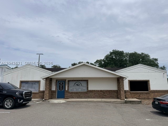Commercial opportunity in Polk City. This one-story concrete building offers approximately 1,412 total square feet under roof, including approximately 1,300 square feet of usable area, situated on a 9,831 square foot lot. Public records classify the property as mixed retail with office units, offering flexible potential for office, retail, professional services, owner-user operations, or investment use, subject to zoning and municipal approval. Convenient location near local businesses, main roads, and the growing Polk County market. Buyer and buyer’s agent must verify all information, including zoning, permitted uses, measurements, square footage, taxes, utilities, flood zone, condition, parking, and municipal or county requirements. Property is offered as-is.