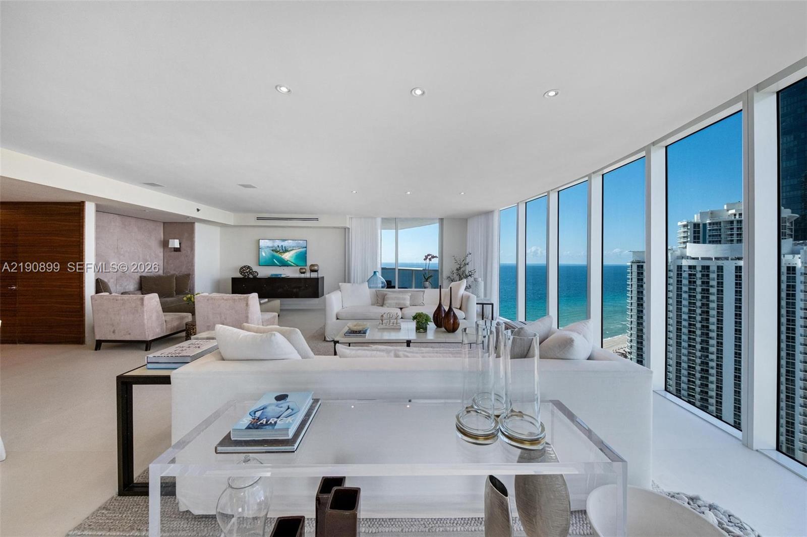 BEST PRICED DESIGNER UNIT ON THE BEACH, WITH STUNNING VIEWS TO THE OCEAN & INTRACOASTAL, COMPLETELY RENOVATED MASTER BATHROOM SUITE, EXTENDED CLOSET SPACE,  3BED 3 1/2 BATH CORNER UNIT SOUTH EAST, FULLY FURNISHED, MODERN STYLE, KITCHEN UPGRADED,  MUST SEE EASY TO SHOW, AND IF YOU LOVE SUNSETS,  COME FOR SUNSET SHOWINGS AND YOU WILL WANT TO STAY.   TURN KEY RESIDENCE, WRAP AROUND OCEAN AND CITY VIEWS. OVER 3000 SQ FEET, DESINGER BATHROOMS AND KITCHENS UPGRADED. SPACIOUS FLOW THRU WITH A MODERN BUT CLASSIC DESIGN. COMES WITH 2 ASSINGED PARKING SPACES,  BUILDING HAS ALL RENOVATED NEW POOL DECK AREA, BEAUTIFUL TENNIS COURTS, SPA, GYM,RESTAURANT,  FULL CONCIERGE, ROOF TOP DECK.