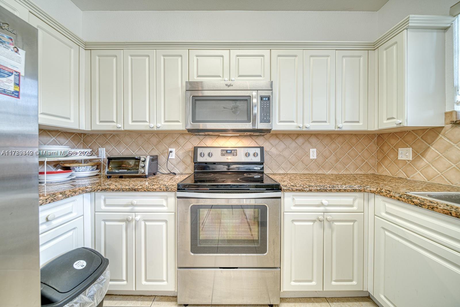 Step into an open and inviting living area, where modern stainless steel appliances and a granite kitchen counter make the kitchen a culinary delight. Ceramic Tiles throughout the unit. The community boasts an array of desirable amenities, including access to a refreshing pool perfect for relaxation and recreation. For those who love to entertain, the barbecue area provides an ideal spot for gatherings with friends and family. Fitness enthusiasts will appreciate the on-site gym, fully equipped to meet your exercise needs. Parking is a breeze with both assigned and guest parking spots available, along with the inclusion of parking facilities that cater to residents' needs. 1 parking + plenty Guest. 1st month rent and 1 security for qualify tenant