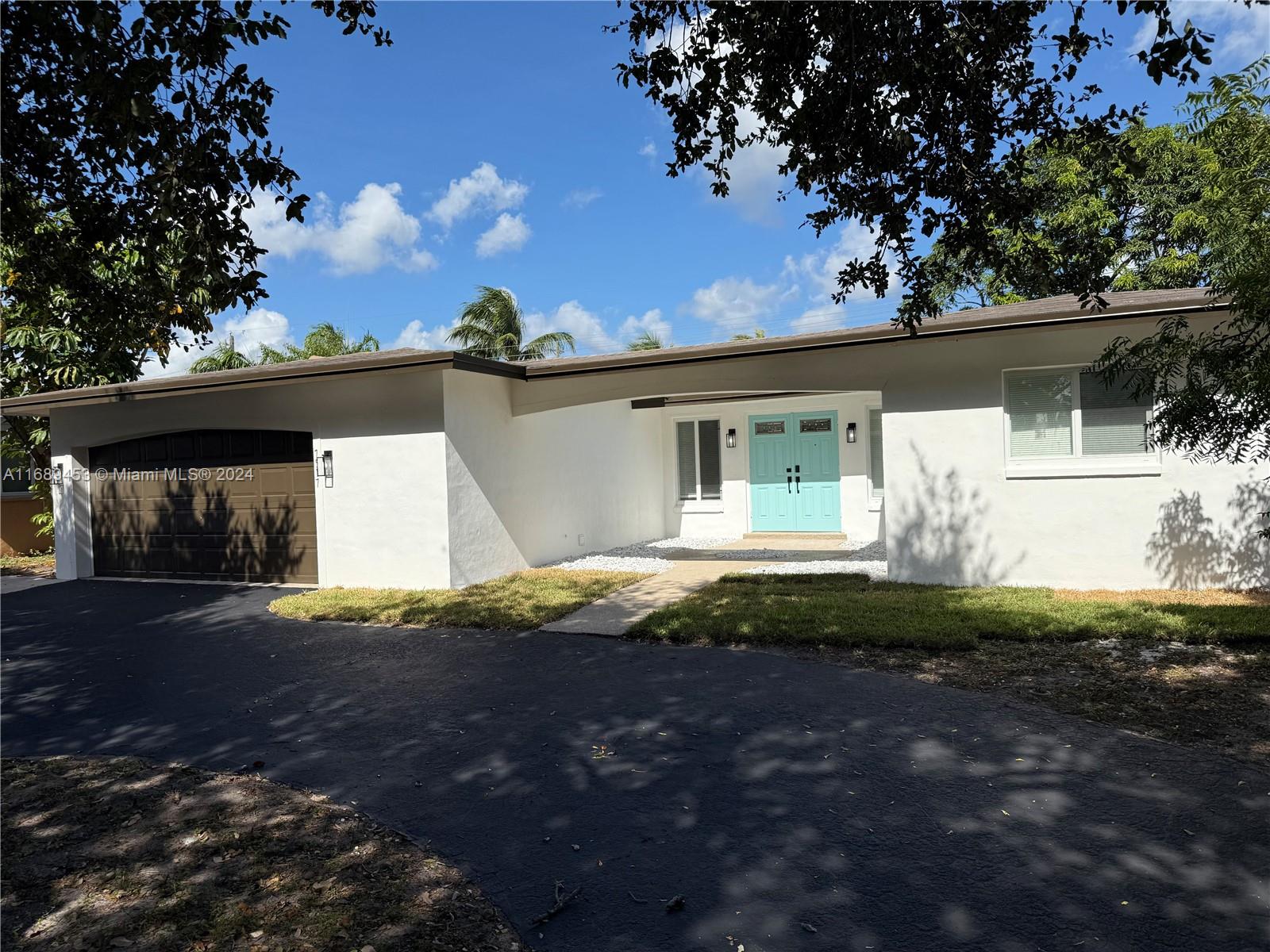 Price dropped below appraised value for quick sale!! New Stainless Appliances will be installed prior to closing!Fully remodeled home in highly sought after Hollywood area. This home features a spacious open floor plan with three bedrooms and two bathrooms. Roof installed in 2017 and has impact windows and doors and AC installed in 2022. Beautiful new kitchen featuring quarts countertops with waterfall features on the oversized island. This home has a 2.5 car garage perfect for all your storage needs or even to convert this into more living space. The patio features a well lit covered terrace and a beautiful pool.