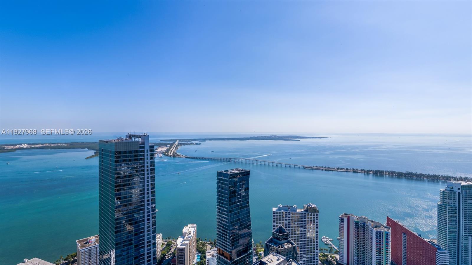 CIPRIANI RESIDENCES MIAMI. Bespoke ultra luxury residence located on the 63rd floor, with breathtaking views and perfect floorplan, private elevator, two bedrooms with a spacious den, three full bathrooms. The eat-in Kitchen is well appointed with custom Italian cabinetry and Wolf and Sub-Zero appliances including wine cooler and integrated refrigerator. Primary bedroom suite includes a gracious walk-in wardrobe and en-suite bathroom with marble floors, freestanding sculptural bathtub and glass-enclosed shower. The amenities serve as an extension of one's home, residents will have exclusive access to private Cipriani dining rooms. Dining services extend to the resort deck, where residents can enjoy a Bellini on the sun terrace or lounge in cabanas beside the 2 swimming pools.