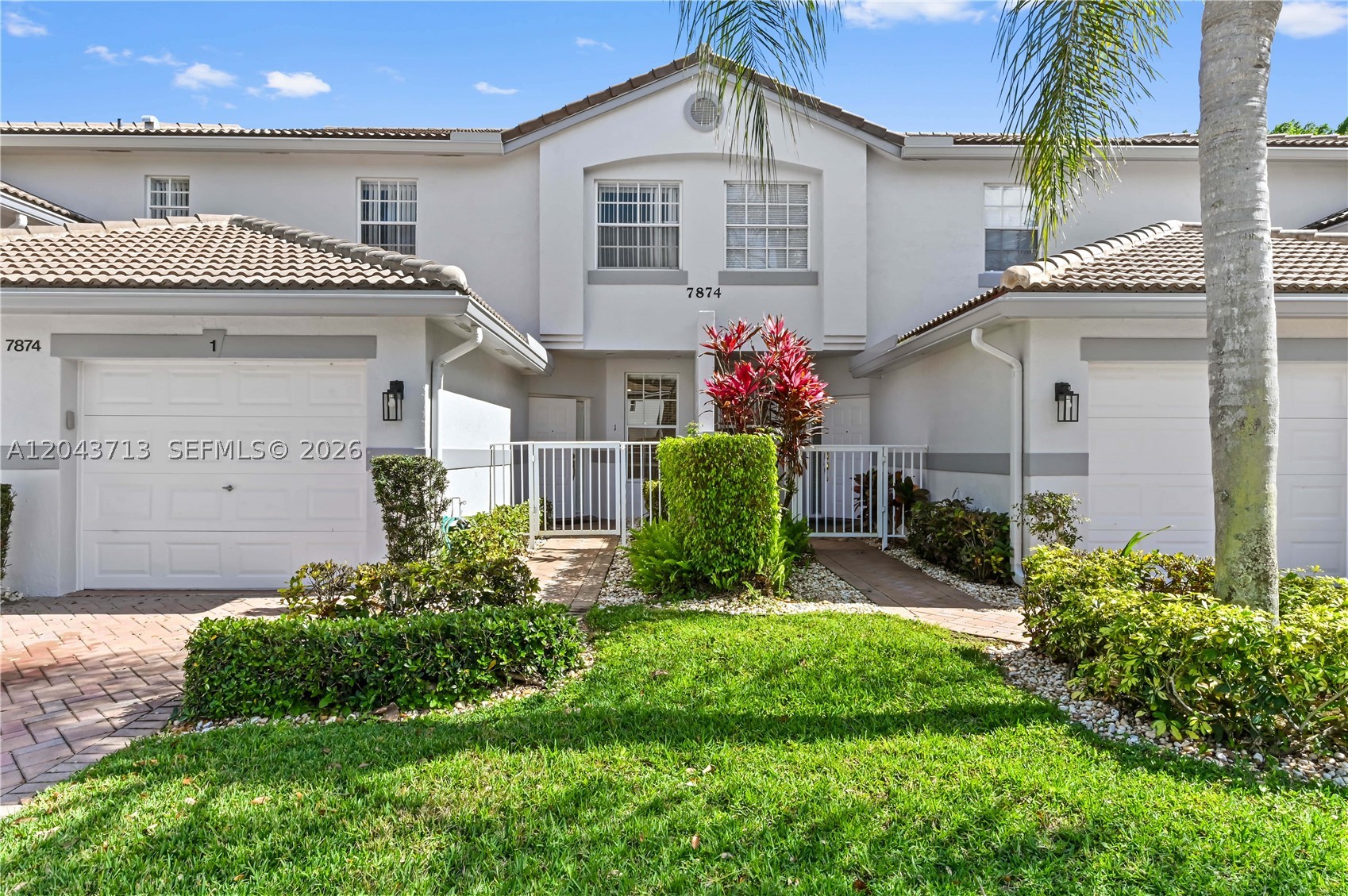Enjoy stunning lake views from this spacious and bright first-floor 3-bedroom, 2-bathroom condo in the highly desirable 55+ community of The Grove. The home features newer appliances (2020+), including a washer, dryer, refrigerator, and microwave, along with a new A/C and water heater (2022) and a new roof (2023). Relax on your enclosed and screened lanai with sliding panels and accordion shutters while taking in serene waterfront views. The open floor plan with split bedrooms provides comfort and privacy, while tile floors, a private laundry room, a walk-in closet, and an eat-in kitchen add to the home's appeal. A retractable screen at the front door allows for a refreshing cross breeze.

Ideally located near the clubhouse, this meticulously maintained home is part of an active, amenity-rich community with a 24-hour manned gate, a newly resurfaced heated and chilled saltwater pool, brand-new pickleball and tennis courts, infrared saunas, billiards, a library, card rooms, an art room with a kiln, shuffleboard, a putting green, bocce, an auditorium, a ballroom, and numerous social clubs. The monthly HOA covers building insurance, roofs, cable with HBO Max, internet, landscaping, and ADT security. Conveniently located near dining, shopping, entertainment, and medical facilities, with easy access to major highways. Call today to schedule a private showing!