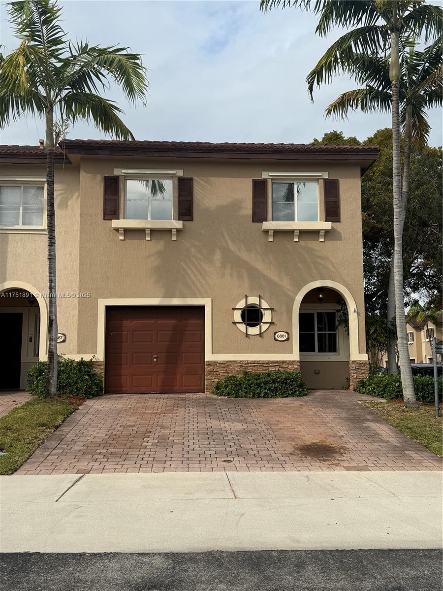 Beautiful corner-unit townhome with a lake view in the Cutler Bay area.  The property features three bedrooms, 2 1/2 baths, tile flooring throughout the first floor, laminate flooring on the second floor, and a one-car garage. All bedrooms are on the second floor, including the master bedroom with a walk-in closet. The kitchen has granite countertops, stainless appliances, a washer, and dryer, available inside the property. Amenities include resort-style pools, a clubhouse, a gym, a child playground, and more. Easy to Show.