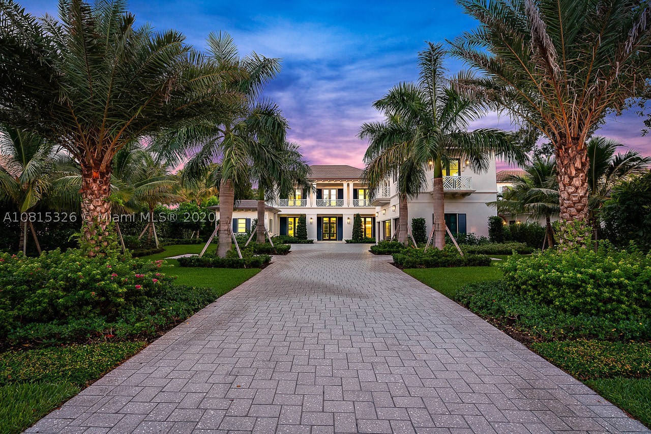STOP YOUR HOME SEARCH This home has it all...Over 120' of waterfrontage. Luxury awaits you around every corner, 5 bedroom plus a club room, a master suite fit for a King and Queen, sleek in design plus a 4 car garage. Chef's kitchen with an over-sized back lit center island prep station, dual wall ovens, LaCornue gas range, all overlooking the family room and breakfast area. Surround yourself in luxury in the Master Suite - His and Hers baths, boutique style closets, soaking tub and large shower. Spend countless hours outdoors looking down the water, enjoying the resort style pool and lounging area. Protected dock for a 70' boat just minutes from the Intracoastal. All located in the stunning community of Admirals Cove.