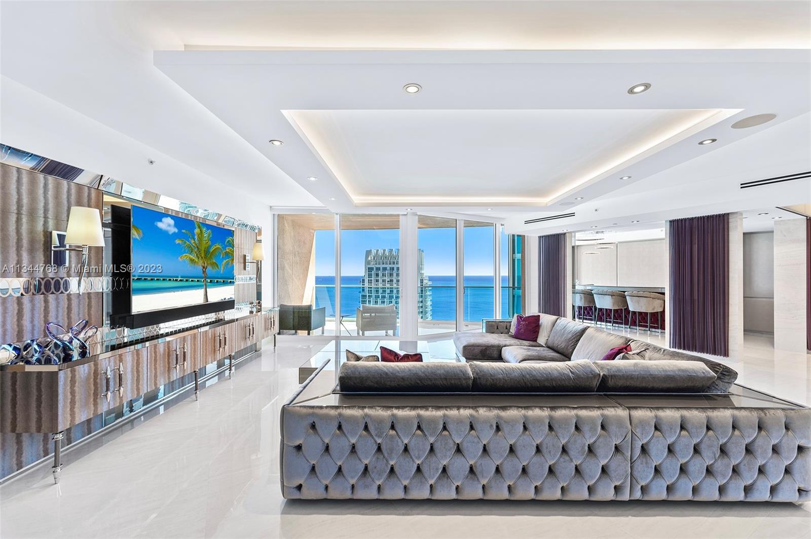 Magnificent double residence, impeccably designed, smart home in the sky where no expense was spared. This work of art is a brand-new double corner condo with 4 terraces & fully furnished by iconic Italian brand Visionnaire. Comprised of 2 condos forming one 4,800 sf masterpiece home w/ endless beach, bay, Miami skyline & sunrise/sunsets. Flow-through plan, Trilogy Light, Onyx Lux Porcelain, Vegan stingray leather walls/doors, marble baths, Manooi chandeliers, wet bar w/ Rolls Royce style ceiling lighting, Crestron controls & security cameras throughout.  Waterfront open kitchen w/ Miele & Viking appliances +multiple wine/cava climate controlled vaults. Principal suite features pink quartz bedroom-sized closets with floor to ceiling glass, 90' movie screen & floating tub above the ocean.