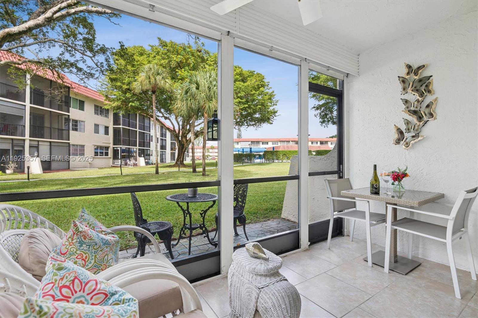 PRICED TO SELL QUICKLY! Rare ground floor 2-bedroom in desirable Phase 1, sold fully furnished and equipped. ALL HIGH IMPACT WINDOWS throughout. Parking is right in front of the unit for your convenience. This bright and spacious home features a welcoming open layout, a well-maintained kitchen, a large primary suite with walk-in closet, and plenty of storage. Screened balcony with easy outdoor access, and the pool is within walking distance along with the outdoor kitchen fully equipped with commercial BBQs. Rec. Lease Paid. Hollybrook is a secure 55+ community where GOLF IS FREE, offering 2 courses, 7 pools, several tennis courts, pickleball courts, restaurant, theater, gym, and more. Move-in ready! Wont last…