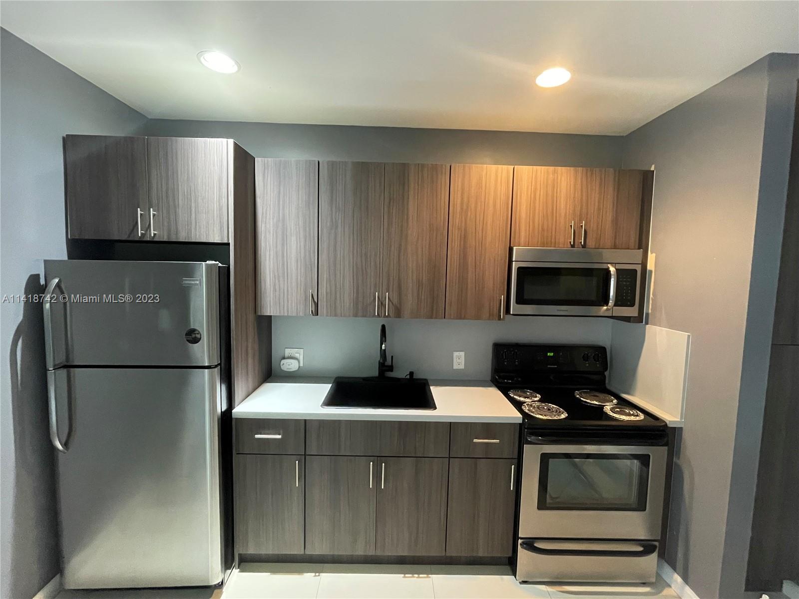 spacious 1-bedroom apartment on 7200 sq ft lot.  Large backyard, privacy fence.   Newly painted.   Washer/dryer in back, central air, shower/bathroom, bedroom with door, closet, windows all around, new kitchen cabinets, fridge and stove and a porch.   Rent includes water & electricity.