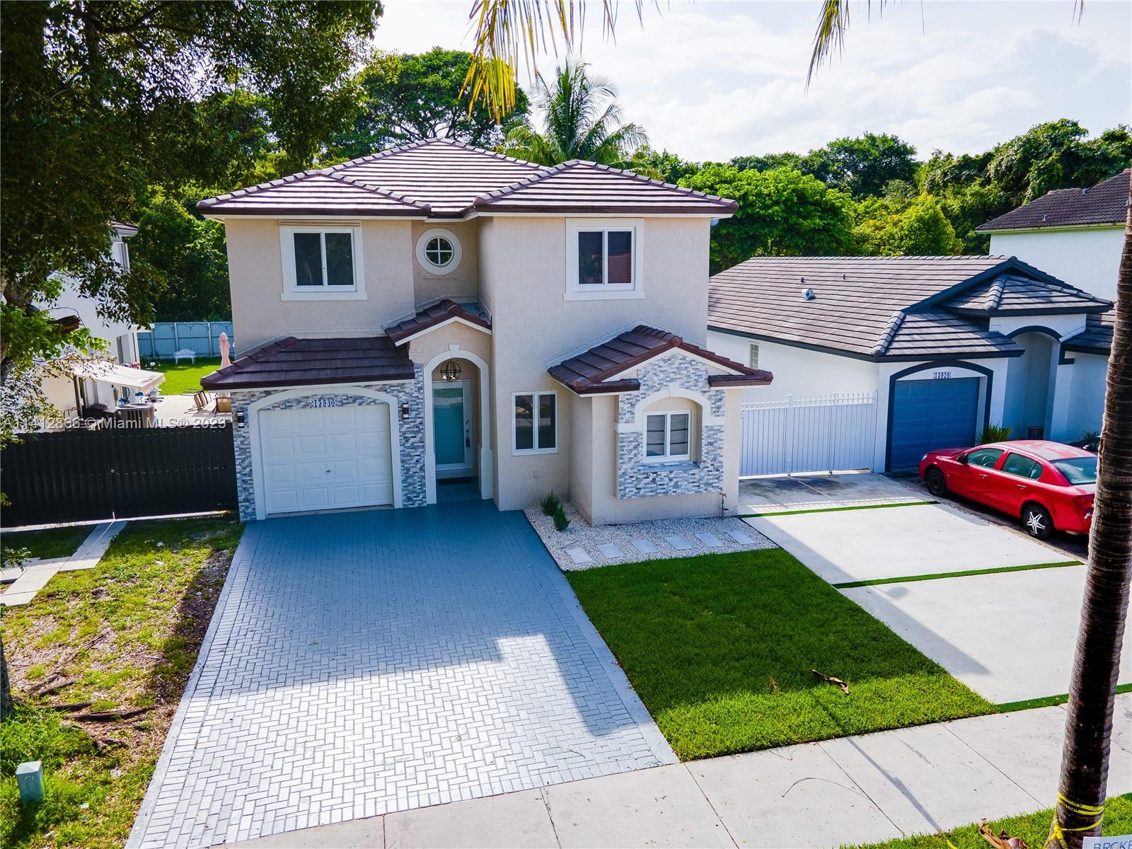 BUY THIS COMPLETELY RENOVATED 4/3 1 POOL HOME WITH NO HOA IN THE BEAUTIFUL AND PEACEFUL KENDALL/ COUNTRY WALK AREA. THE PROPERTY FEATURES THE FOLLOWING: NEW FLAT TILE ROOF, JR MASTER/IN-LAW QUATERS LOCATED IN THE FIRST FLOOR, 2016 POOL WITH NEW DIAMOND BRIGHT SURFACING, IMAPCT WINDOWS AND DOORS & ACCORDIAN SHUTTERS, NEW PORCELAIN FLOORS IN THE 1ST FLOOR, NEW VINYL FLOORS IN THE 2ND FLOOR, NEW KITCHEN & NEW STAINLESS STEEL APPLIANCES WITH QUARTZ COUNTER TOPS, NEW BATHROOM & VANITIES WITH GLASS SHOWER ENCLOSURES, NEW LED LIGHTS THROUGH OUT, NEW ALUMINUM FENCE AND MUCH MORE. THE PROPERTY IS CLOSE TO SHOPPING CENTERS, MALLS, PARKS, SCHOOLS, BIKE TRAILS,HOUSE OF WORSHIP AND IS MINUTES AWAY FORM 836 & TURNPIKE.