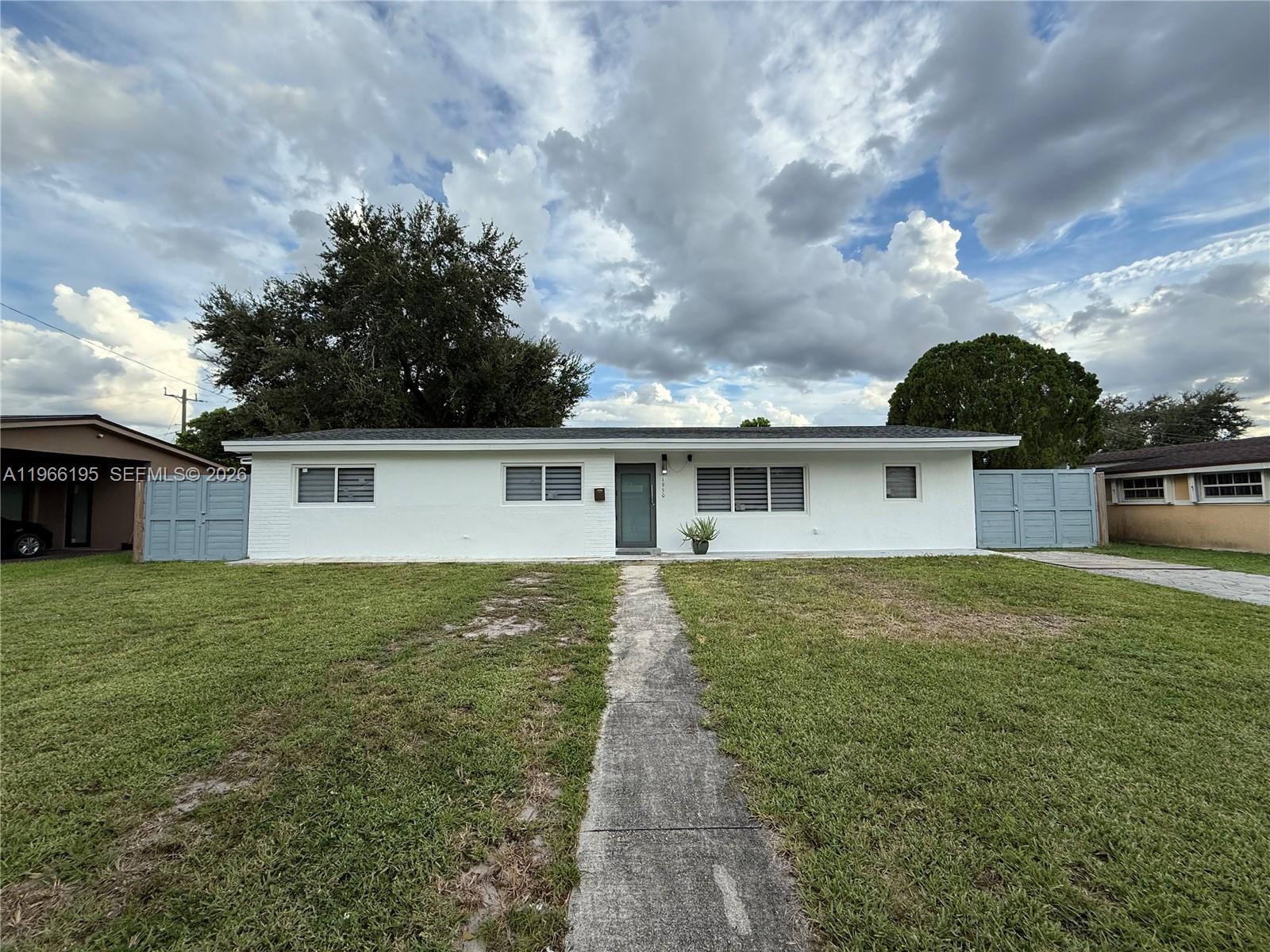 Updated Miami Gardens pool home set on a generously sized lot in a quiet residential neighborhood, offering a highly versatile layout that can function as a 4 bedroom / 3 bathroom residence or main home plus in-law quarters, ideal for extended family, guests, or rental income potential. Recent improvements include upgraded electrical and plumbing, a new roof, impact windows and doors, along with a remodeled kitchen and remodeled bathrooms, providing peace of mind and true move-in ready appeal. Open living and dining areas create a comfortable flow, while the split layout enhances privacy between living spaces. Outdoor living is a highlight, featuring a covered terrace with outdoor cooking setup, a renovated in-ground pool, and a spacious fenced yard including Built in shed, perfect for entertaining, family gatherings, or everyday enjoyment. The expansive lot offers flexibility and a sense of openness rarely found at this price point. Additional features include tile flooring throughout, ample parking, and a convenient location minutes from Hard Rock Stadium, major highways, shopping, dining, and schools. A strong opportunity for buyers seeking flexibility, upgrades, and lifestyle in a peaceful Miami Gardens setting.