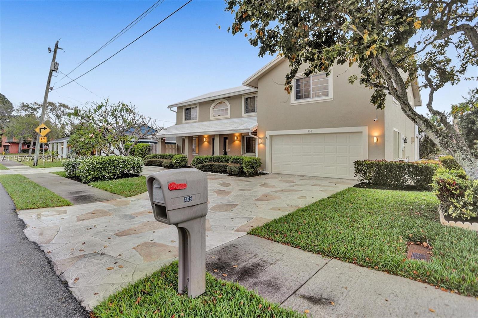 Exquisite and truly one-of-a-kind, this custom-built 6-bedroom, 3-bath estate residence offers 3,151 square feet under air and is ideally positioned on a prime corner lot in the sought-after Hillsboro Heights community. A circular driveway,resort-style pool, and new whole-house generator set the tone for refined South Florida living.
Designed for both elegance and functionality, the home welcomes you with a dramatic two-story foyer, formal living and dining rooms, and a beautifully appointed kitchen featuring a center island, pantry, breakfast area, and lunch counter, seamlessly flowing into a spacious family room

Outdoor living is elevated with a 60-foot covered patio, Move-in ready and ideally located just one mile from the beach, offering the ultimate blend of luxury, comfort, and coastal lifestyle.The second level offers three additional bedrooms, a full bath, a large laundry room, walk-up attic storage, and a private primary suite with its own sitting/family room, expansive bath with jetted tub, separate shower, and dual vanities. Outdoor living is enhanced by a 60’ covered patio, second-floor balcony, sparkling pool, and lush surroundings. Additional features include a new whole-house generator, solar hot water system, X flood zone, and numerous upgrades throughout. Move-in ready and conveniently located just 1 mile from the beach. Above Ground Jacuzzi Fire Place Furniture Availabe for Purchase all you need is your toothbrush