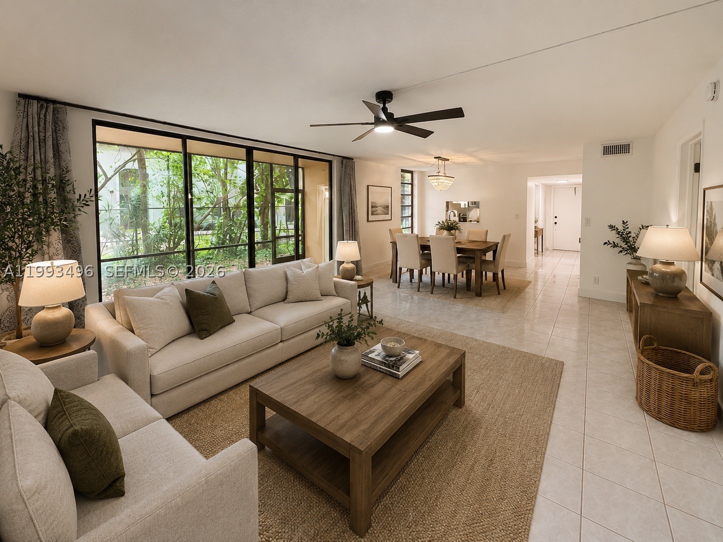 Don’t miss this opportunity to own a spacious and well-positioned 2 bedroom, 2 bathroom corner unit in the highly desirable Lago West community in Plantation. Situated on the first floor, this residence offers an expansive 1,130 square foot layout with a bright open living and dining area, split bedroom floor plan, and a large screened-in patio overlooking peaceful canal and garden views. The corner positioning provides added privacy and an abundance of natural light throughout. Recently updated for comfort and modern living, the unit features a clean interior with tile flooring throughout, an updated kitchen with ample cabinetry, and newly renovated bathrooms. The layout flows seamlessly, making it ideal for both everyday living and entertaining. Both bedrooms are generously sized with walk-in closets and easy access to full bathrooms. The property includes hurricane protection, covered parking conveniently located right in front of the unit, and is move-in ready, while still offering the opportunity to personalize and add value over time. Lago West is a well-maintained community offering a clubhouse, pool, fitness center, tennis courts, and beautifully maintained grounds. Ideally located just minutes from I-595 and I-75, Sawgrass Mills Mall, top-rated schools, dining, shopping, and Fort Lauderdale-Hollywood Airport, this property offers excellent convenience in a central Plantation location. A great opportunity for both end-users and investors alike. Vacant & easy to show.