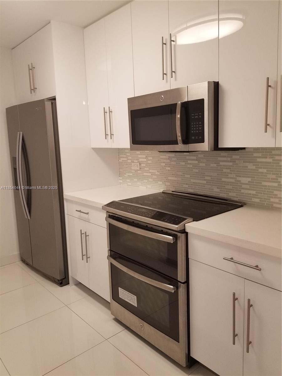 WEITZER AVENTURA PLACE CO - Residential