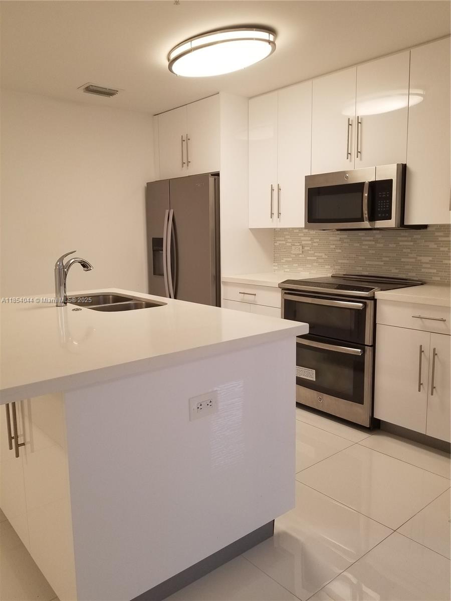 WEITZER AVENTURA PLACE CO - Residential