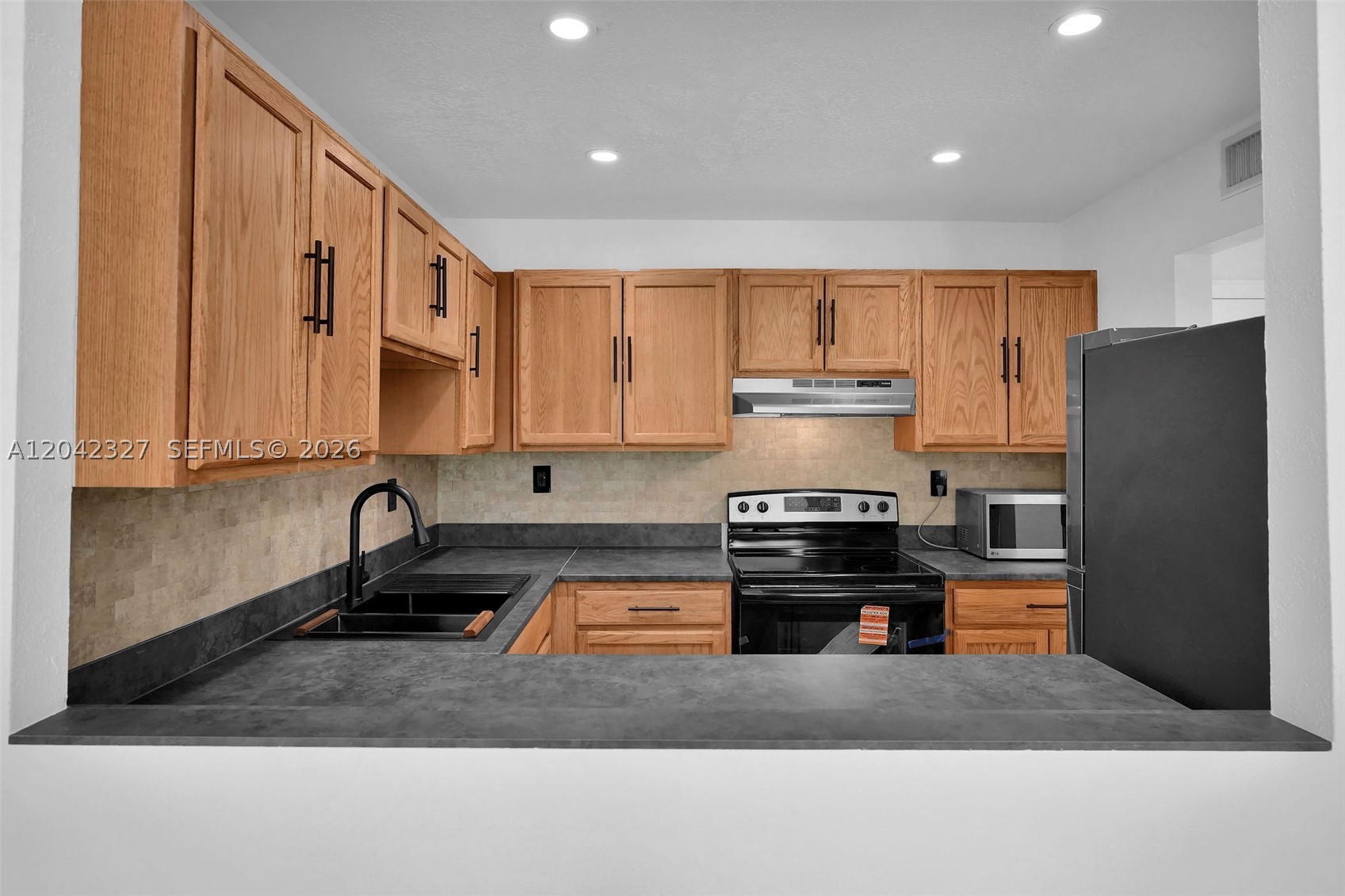 WISPERWOOD VILLAGE CONDO - Residential