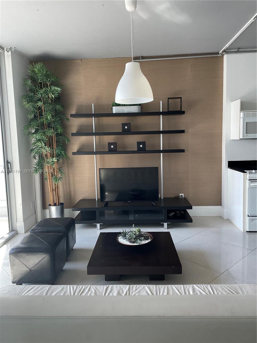 Nicely FURNISHED unit at Neo Vertika Condo. Corner unit for more privacy. This 1/1 has soothing views to the swimming pool and skyline. Open space, Porcelain flooring throughout, washer and dryer, Close to Metro Station, Mayor Highways, Supermarkets, Brickell City Center and Village