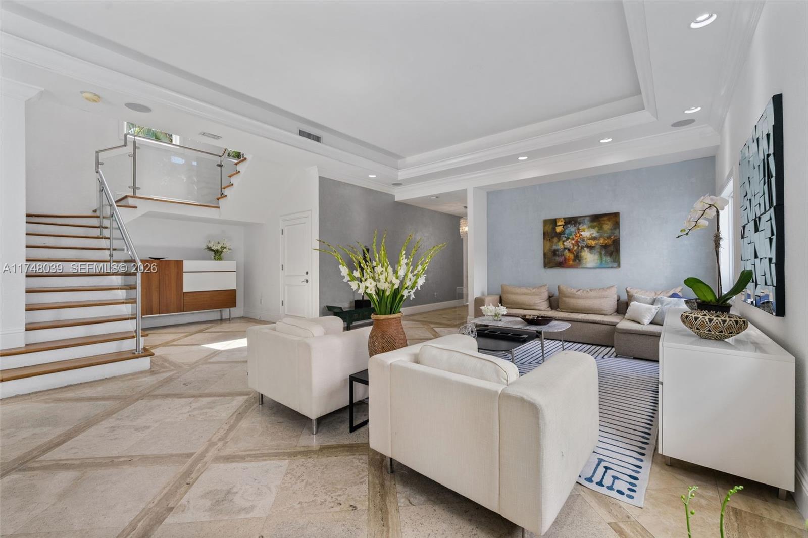 Experience the height of luxury living in Key Biscayne’s most prestigious gated community, Grand Bay Villas & Estates. This beautiful villa, located in a quiet cul-de-sac, features 5 spacious bedrooms and 7 bathrooms, private heated pool with an expansive terrace. A balcony provides additional outdoor space, and the large living, dining, and family rooms offer direct access to the terrace and pool, perfect for entertaining. The villa also includes full maid’s room & bath. (All Bedrooms are in-suite)Residents enjoy 24-hour security, and have access to the community’s playground for children. Monthly maintenance fees cover pool and landscaping maintenance. Properties in Grand Bay Villas rarely come to market. Don’t miss the opportunity to own a piece of paradise in Key Biscayne.