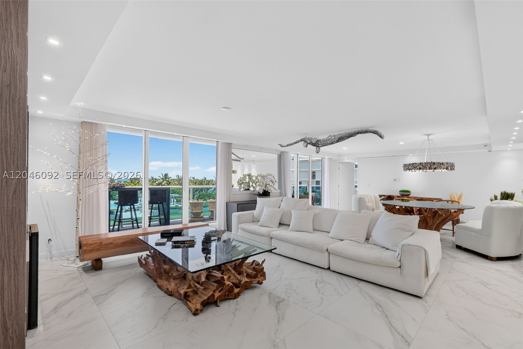 One-of-a-kind turnkey oceanfront compound at the iconic Roney Palace, combining 4 contiguous folios—Units 440–443—with approximately 2,800 SF under ac of sophisticated living space, 4 parking spaces, and 2 full balconies. Three bedrooms Three Bathrooms and 1 powder room. Wide direct ocean and pool views extend from every bedroom and the main living areas, creating a rare, uninterrupted connection to the ocean.

Designed for privacy, flexibility, and effortless entertaining, this exceptional residence can function as one expansive home or be closed off into 2 independent private wings—ideal for guests, extended family, adult children, staff, or a dedicated wellness and entertaining suite. The home features 2 full kitchens with premium Ornare cabinetry, custom Ornare closets, an oversized statement island, extensive designer built-ins, and refined finishes throughout.

Enjoy generous open living and dining areas, spa-inspired baths, a dry sauna, and a private jacuzzi/cold-plunge wellness area. Its unique 4-folio configuration provides exceptional optionality for full-time living, hosting, multi-generational use, or a private retreat in the heart of Miami Beach. A rare offering with the scale, functionality, privacy, and direct-ocean lifestyle of a private compound, paired with the sought-after Roney Palace and 1 Hotel lifestyle, beach access, pools, and resort amenities. Rental policy is min 30 days 12 x a year. Ask for the 3D video.