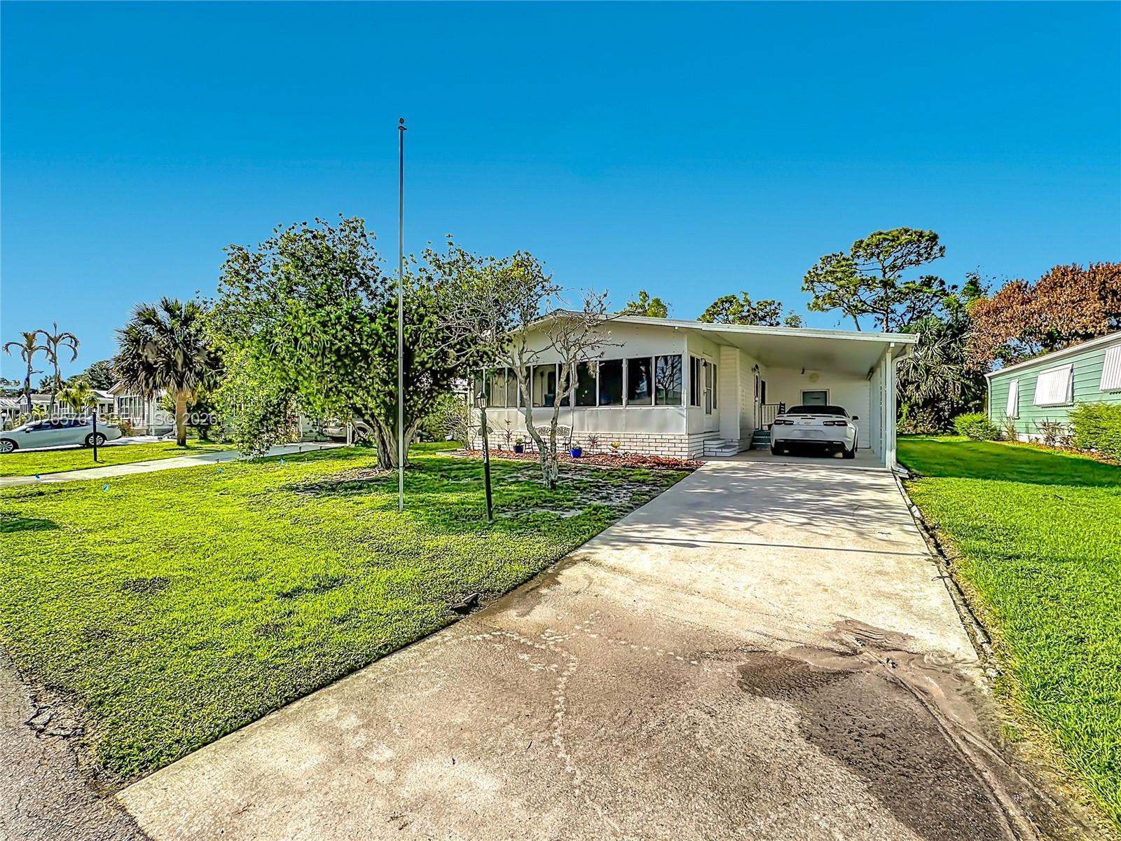 LAND OWNED! Welcome to this sought-after 55+ Savanna Club community! This charming 2-bedroom, 2-bath home features an open and inviting layout, new appliances, and a roof that is only 5 years old for added peace of mind. Enjoy a low-maintenance lifestyle with access to resort-style amenities including golf, pools, fitness centers, tennis, pickleball, and an active social calendar. Conveniently located near shopping, dining, healthcare, and the Treasure Coast's beautiful beaches, this home is perfect for enjoying the Florida lifestyle.