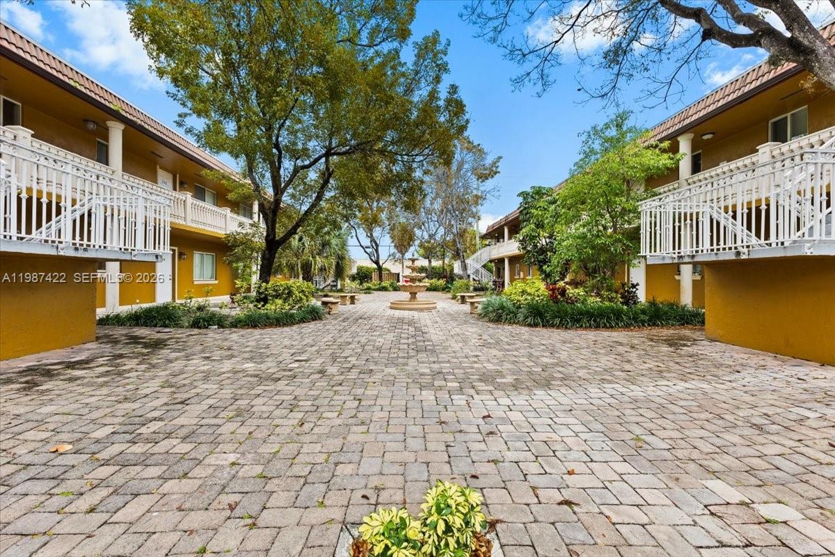 Amazing investment opportunity and ideal for first time buyers. YOU WILL NOT FIND A CONDO WITH THIS LOW MAINTENANCE FEE IN SOUTH FLORIDA, $265 PER MONTH NO SPECIAL ASSESMENTS!!! Beautiful and spacious 2-bedroom, 2-bath corner unit located on the second floor for added privacy, featuring a large walk-in closet in the master bedroom and a generous closet in the second bedroom, a bright white kitchen with stainless steel appliances and granite countertops, and the convenience of an in-unit washer and dryer; and the property is ideally situated within walking distance to Hollywood Boulevard, offering easy access to major roads, the beach, vibrant nightlife, and a variety of restaurants, all within a quiet small building. No lease restrictions. **SE HABLA ESPANOL**