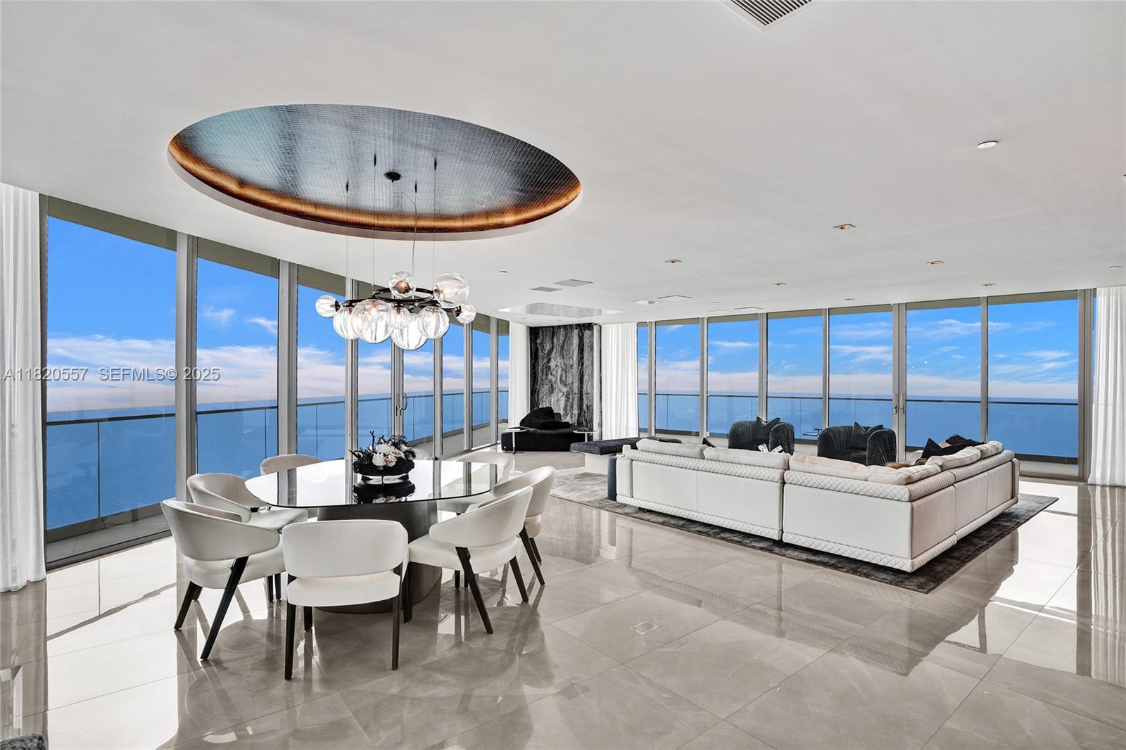 This extraordinary corner unit with unobstructed views,  Armani Casa residence includes its own private oceanfront cabana, an exclusive feature reserved for a handful of owners. The cabana provides the perfect seaside escape with lounge area, full bath and wet bar. Inside the residence Unit 5000 which is the most desirable line in the tower,  expansive unobstructed ocean and city views, and a seamless flow through floor plan with floor to ceiling glass walls. The gourmet kitchen features custom Armani cabinetry, stone countertops and premium Wolf & Sub Zero appliances.  Residents enjoy elite amenities curated by Giorgio Armani. Oceanfront restaurant available to residents only, full service spa, state of the art fitness center, cigar and wine lounges, children’s play area, concierge, and valet service. Where ocean meets sky!!