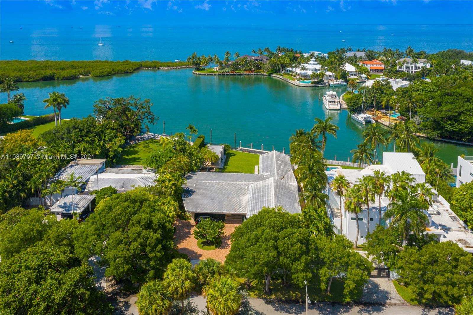 Incredible location on prestigious Harbor Drive with stunning and captivating views of the Harbor and Bay.  This wonderful waterfront property sits on 20,300 Sq Ft with 100 feet on the water and a magnificent dock which makes it the perfect boater’s dream and paradise.  This elegant and graceful residence has been remodeled several times with a fantastic master suite on the first floor, plus 4 in-suite bedrooms, staff quarters, powder room, formal living and dining, private kitchen and an amazing patio and pool area with a lovely gazebo for those who like to entertain.  Rare opportunity to own one of the most desired addressed on paradise island “Key Biscayne” and enjoy the community and family lifestyle. Property is tenant occupied.