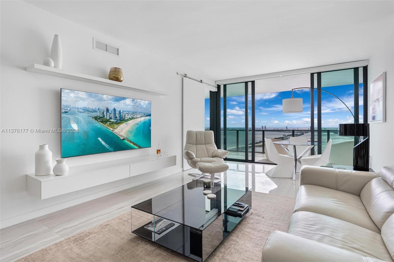Experience the luxury of living in the brand new ONE PARAÍSO CONDO! This rental features a beautiful 1 bed + den, 1.5 bath apartment with a private elevator, high-end appliances and furniture, a walk-in closet, and a large balcony with mazing, breathtaking view of the bay and ocean from the large balcony, making it the perfect place to relax and take in the scenery. Marble flooring, a kitchen island, and a range of other upgraded features are included as well. The building offers a variety of amenities, such as pools, hot tubs, a spa, a fitness center, BBQ areas, a community room, a wine bar, and exclusive membership to a resident-only lounge club above the Amara Restaurant. We offer 3-month up to 6-month leases!
