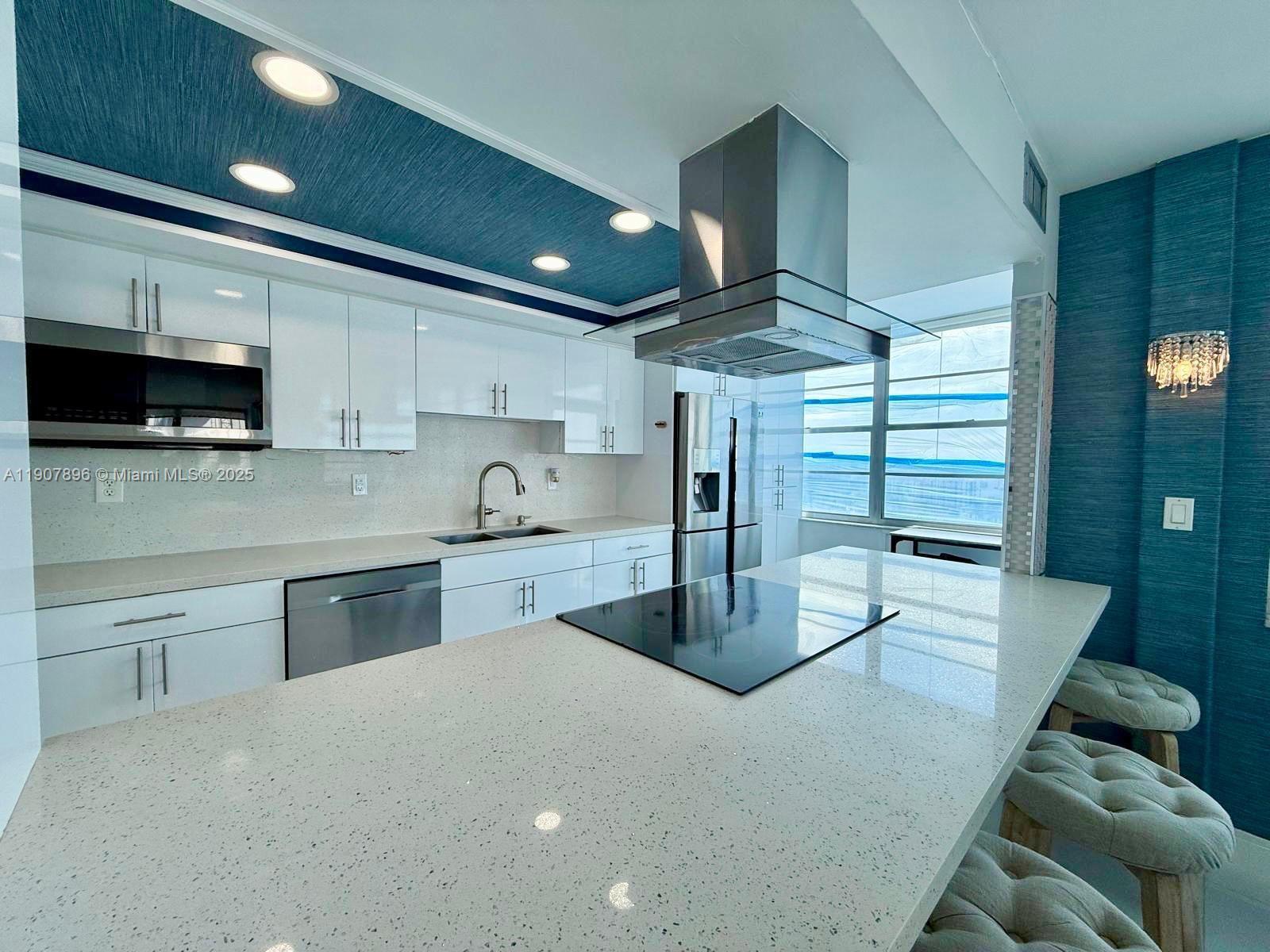 Welcome to this gorgeous 2-bedroom, 2-bathroom residence offering luxury living at its finest! Located on the 16th floor, this spacious condo boasts a bright, open layout with beautiful white ceramic floors flowing throughout. Modern kitchen, featuring granite countertops, sleek cabinetry, and a premium cooktop. Every room feels airy and expansive with large windows that fill the home with natural light. Enjoy walk-in closets, a huge open balcony with city views, and elegant finishes throughout. Enjoy an array of resort-style amenities, including pool, fitness center, clubhouse, barbecue area, and tennis courts. Building is situated in a prime location near Aventura Mall, fine dining, shopping, and entertainment. Experience sophisticated urban living with comfort, style, and convenience.