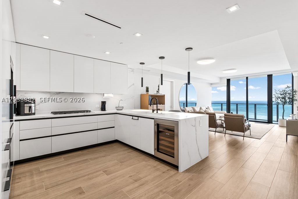 Available 2 bed / 2.5 bath plus den residence at Solemar is a refined expression of contemporary elegance and comfort. This beachfront residence delivers stunning ocean views from every bedroom and main living area. The well-designed split floor plan features a versatile den that can seamlessly serve as a third bedroom or private office, complete with custom-built-ins. Every element has been carefully selected, from sophisticated window treatments and designer wall coverings to upgraded bathrooms and lighting, offering a perfect balance of style and practicality. Solemar residents enjoy premier amenities including 24/7 valet, sauna, steam room, fully equipped fitness center, and exclusive beachfront service.